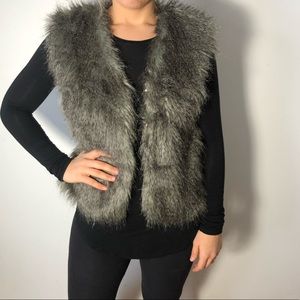 Faux fur gray vest.